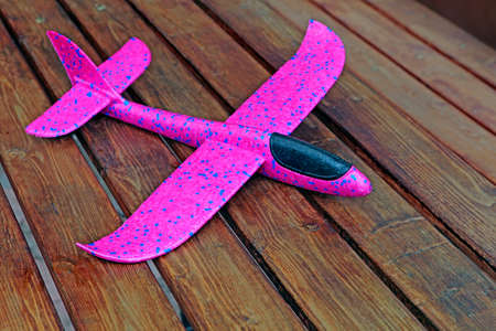 toy plane wooden table background nobody