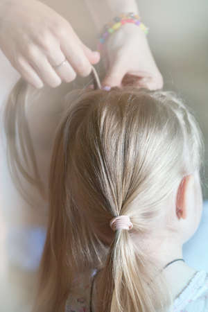 woman hand children girl hairstyle