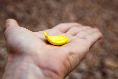 banana man hand stone backgroundの写真素材