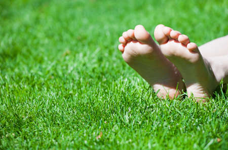 children girl foot grass background