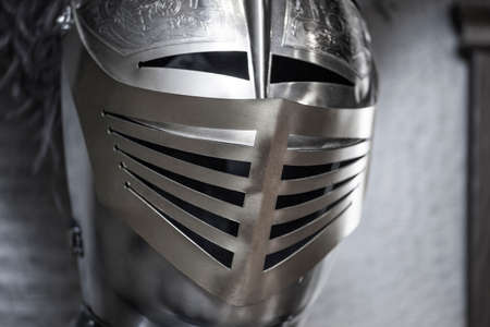 knight steel helmet wall backgroundの写真素材