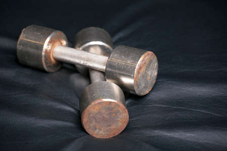 old rusty dumbbell leather backgroundの写真素材