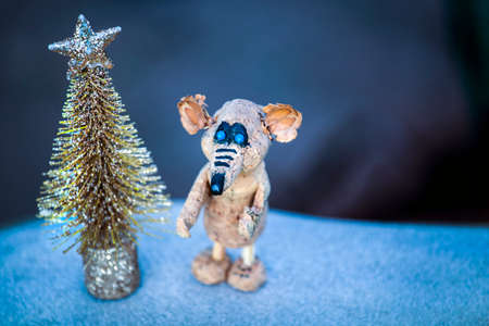 gold fir tree rat snowの写真素材