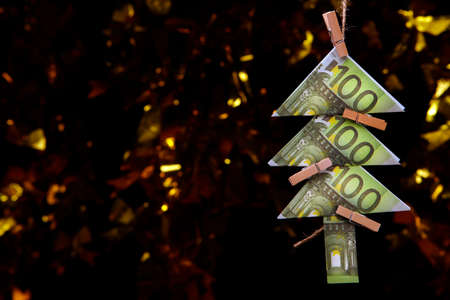 money rope clothespin dark background