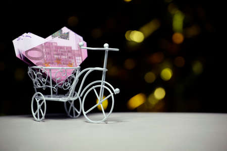 bicycle money banknote dark backgroundの写真素材