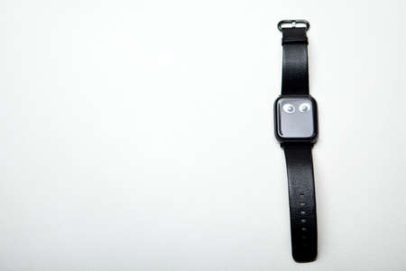 clock device white leather backgroundの写真素材