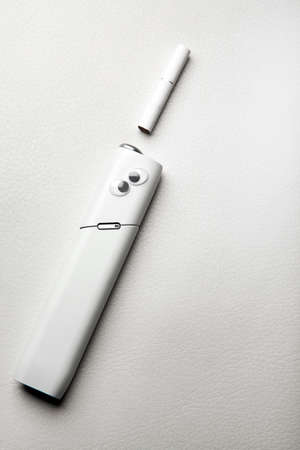 electronic smoke device white leather background