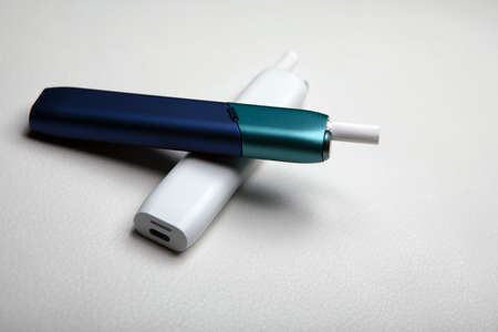 electronic smoke device white leather background