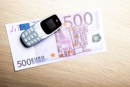 mobile phone money table background