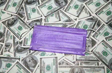 image of mask on money banknotes