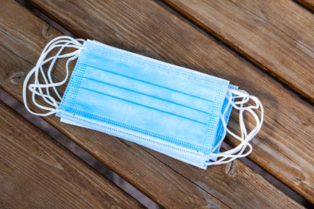 image of mask on wooden backgroundの写真素材