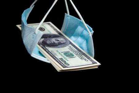 image of money mask dark backgroundの写真素材