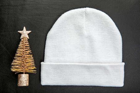 image of hat new year toy dark leather background
