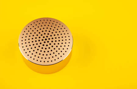 image of sound speaker yellow backgroundの写真素材