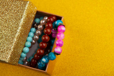 image of bracelet box gold background