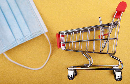 image of trolley mask gold backgroundの写真素材