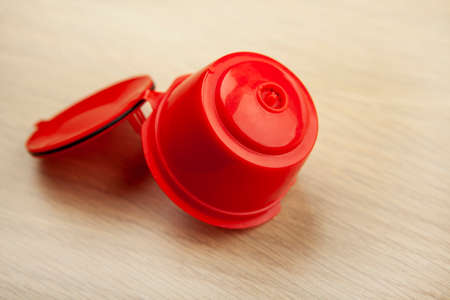 image of coffee capsule wooden desk backgroundの写真素材