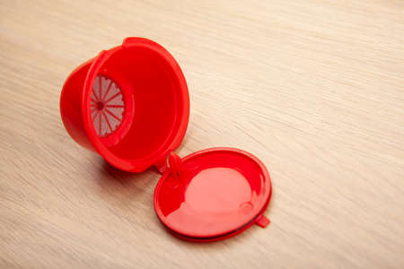 image of coffee capsule wooden desk backgroundの写真素材