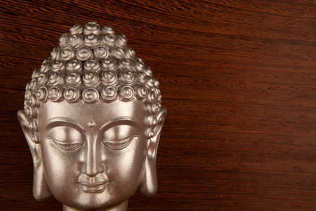 image of buddha wooden backgroundの写真素材