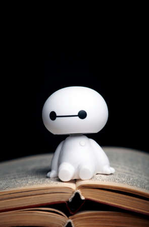image of robot book dark backgroundの写真素材