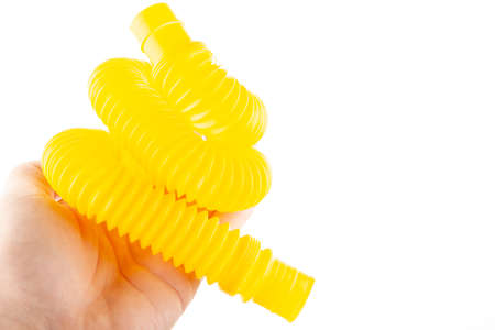 image of tube in hand on white backgroundの写真素材