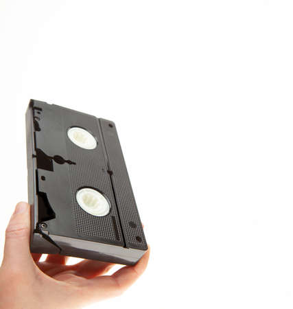 image of vhs tape hand white background