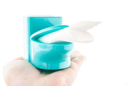 image of miniature toilet paper white background