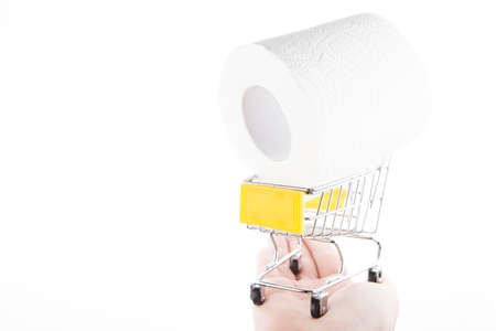 image of toilet paper roll trolley hand white backgroundの写真素材