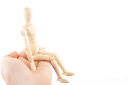 image of wooden figure hand white backgroundの写真素材