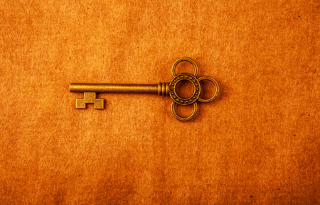 image of old key paper backgroundの写真素材