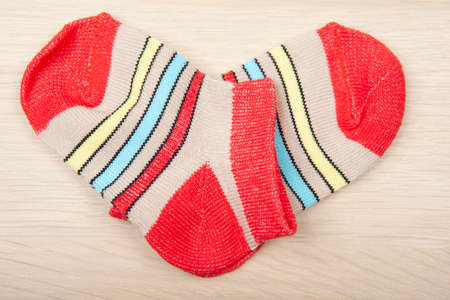 image of socks wooden desk backgroundの写真素材
