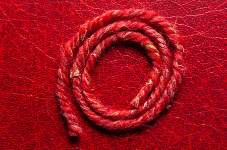 image of red wool threadの写真素材