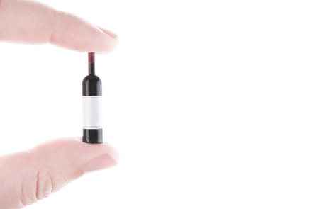 wine bottle hand white backgroundの写真素材