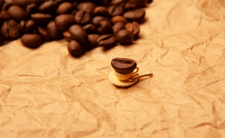coffee beans on crumpled paper backgroundの写真素材