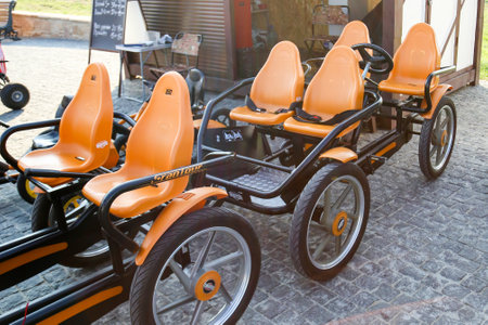 A four seater pedal cart for rent parking.のeditorial素材