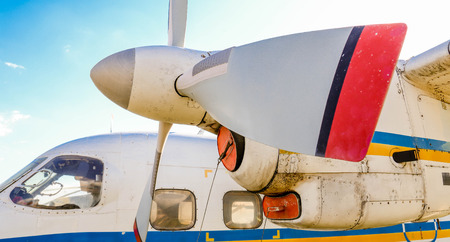 A view of an old  turboprop-powered aircraft propeller and engine.の写真素材