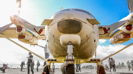 A front- and bottom-side view of an old  turboprop-powered aircraft.のeditorial素材