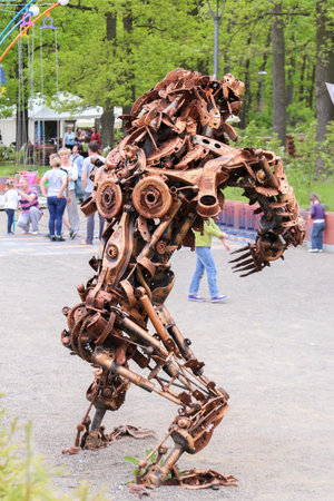 Wild bear figure statue made of scrap metal and rusty gears. Central park, Bucha, Ukraine, 21st of May, 2017のeditorial素材