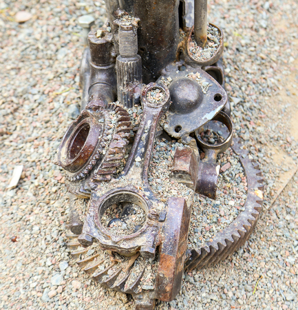 Old rusty gears and industrial parts welded in a figures. The figure of iron horse.の写真素材