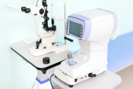 Modern ophthalmology clinic. Keratometer device measuring curvature of cornea. Prevention of astigmatism desease. 	High-tech solutions for eye care.の写真素材