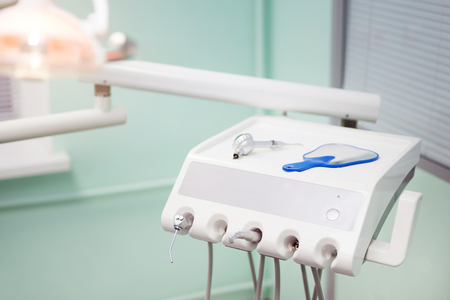 Dental instrument in stomatology clinic. Compressed air and water irrigation nozzle. Professional dentist toolsの写真素材