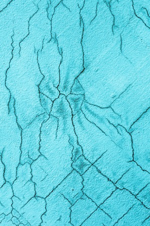 Texture of white blue cracked wall. Small straight cracks. Direct fracture on painted surface. Cells...
