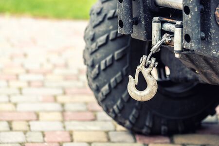Close-up atv quadbike whick hook mounted on offroad all-terrain vehicle.の写真素材