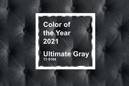 Quilted velour buttoned ultimate grey color fabric wall pattern background. Elegant vintage luxury dark black steel metal colour sofa upholstery. Interior plush backdrop. Color of the year 2021の写真素材