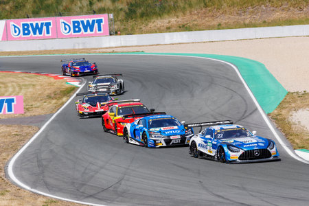 Oschersleben, Germany, May 28, 2023: Scenic view battle fast Mercedes BMW Audi Lamborghini Ferrari Porsche DTM at Oschersleben Motorsport Arena race track. European motors auto sport competitionのeditorial素材