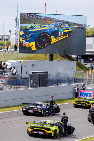 Oschersleben , Germany. 29th April, 2024. Scenic view  fast Mercedes BMW Audi Lamborghini Ferrari Porsche DTM Oschersleben Motorsport Arena starting grid race track. European motors auto sport competition.のeditorial素材
