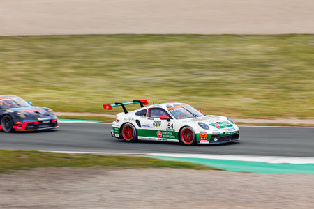 Oschersleben, Germany. 29th April, 2024. Porsche Sixt Carrera Cup Deutschland Scenic view battle fast 992 supercars at Oschersleben Motorsport Arena race track. European motors auto sport competitionのeditorial素材