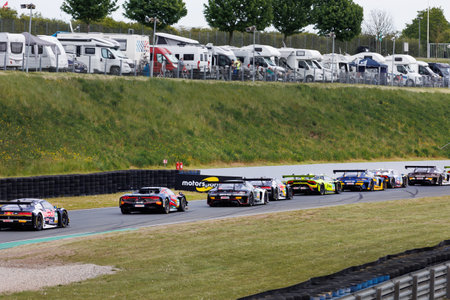 Oschersleben , Germany. 29th April, 2024. Scenic view battle fast Mercedes BMW Audi Lamborghini Ferrari Porsche DTM at Oschersleben Motorsport Arena race track. European motors auto sport competitionのeditorial素材