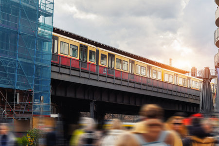Scenic evening view S-bahn subway train bridge in Berlin Mitte central district on Hackescher Markt at dusk sunset. Urban european transport commute cityscape Germany scene backgroundの写真素材