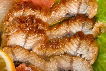 Cooked salmon fillets in assortmentの写真素材